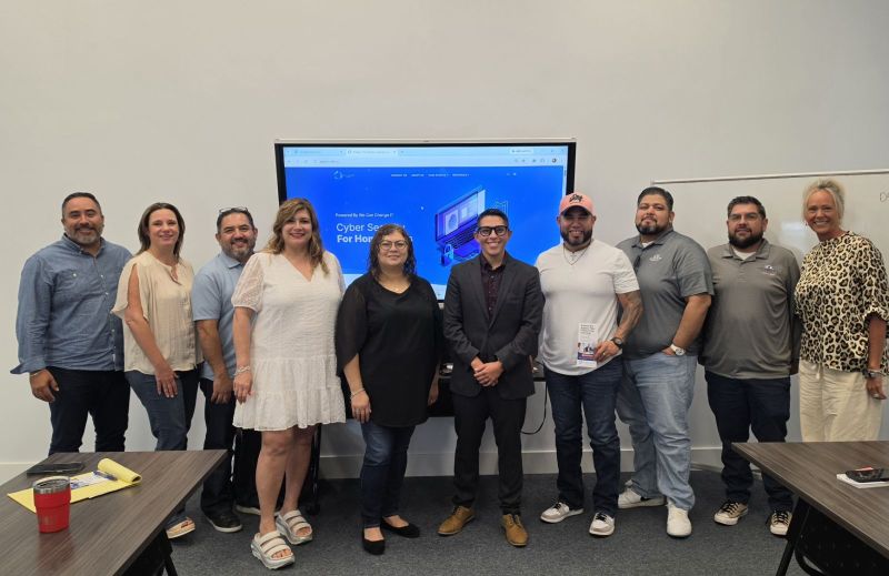 We Can Change IT delivering a cybersecurity presentation to an insurance agency audience.